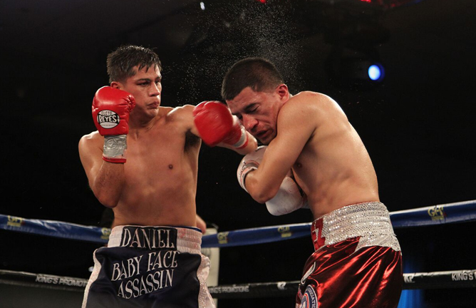 Danny Roman stopping Adam Lopez. Photo Credit: Tom Casino / Showtime