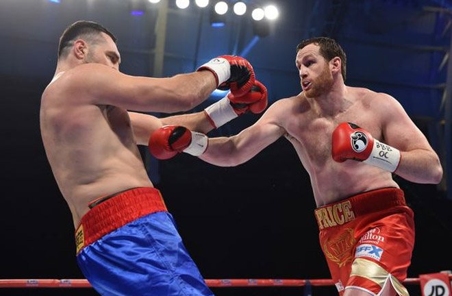 Price in action against Christian Hammer. Photo Credit: Liverpool Echo 