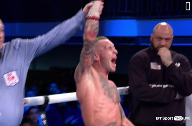 Ronnie Clark celebrates his victory by decision over Zelfa Barrett on Saturday night at York Hall.