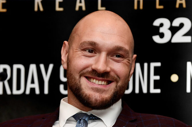 Tyson Fury announcing his return to the ring with Frank Warren. Photo Credit: The Independent Newspaper.