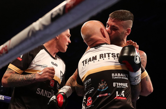 Ritson celebrating with his Dad and team on Saturday night at the Metro Radio Arena. Photo Credit: Lawrence Lustig