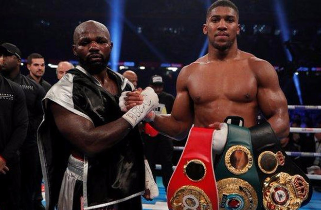 Anthony Joshua stopped Carlos Takam in round 10 to defend IBF and WBA titles. Photo Credit: MyJoyOnline.com