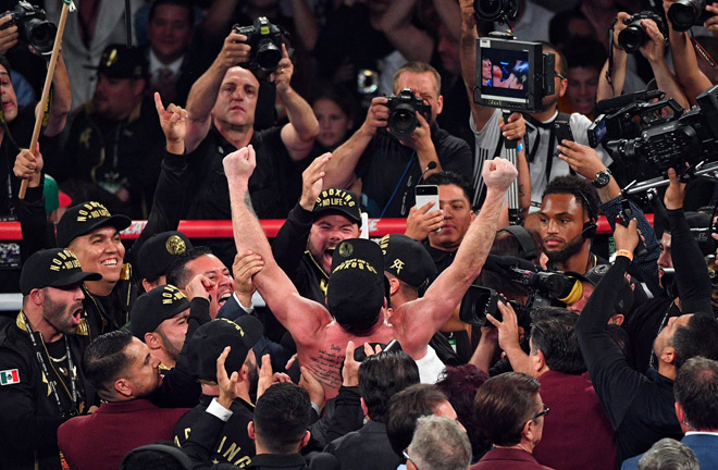 Canelo rejoiced with his team as the decisions were announced.Photo Credit: Twitter - @PowersImagery.