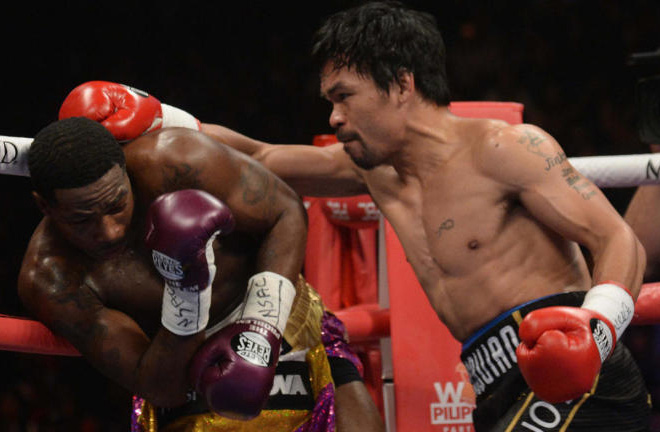 Pacquiao dominated most of the fight with the cleaner shots. Photo Credit: CBS Sports