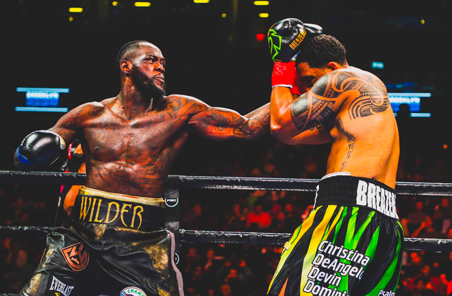 Deontay Wilder defeats Dominic Breazeale in first round.