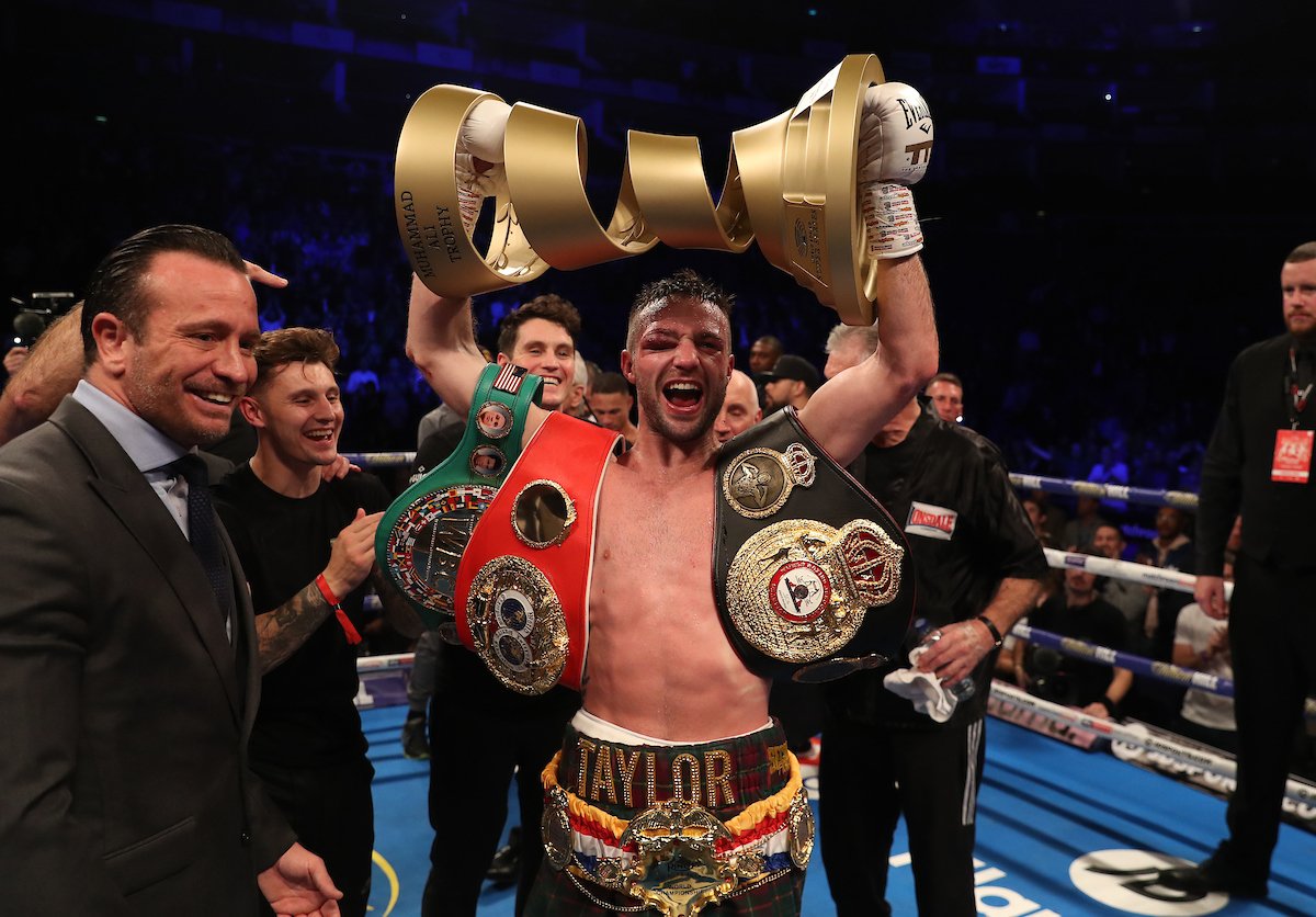 Josh Taylor picked up the Muhammad Ali Trophy after becoming unified champion against Regis Prograis Credit: Matchroom