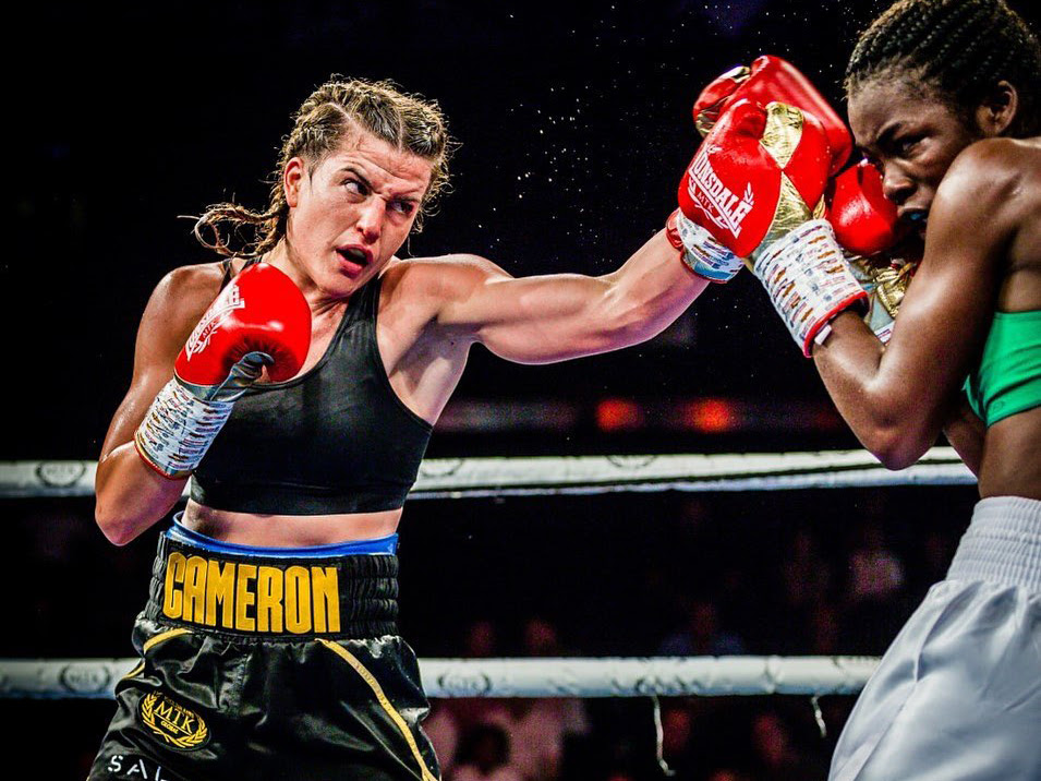 Unbeaten Cameron cornering world champions. Credit: MTK Global