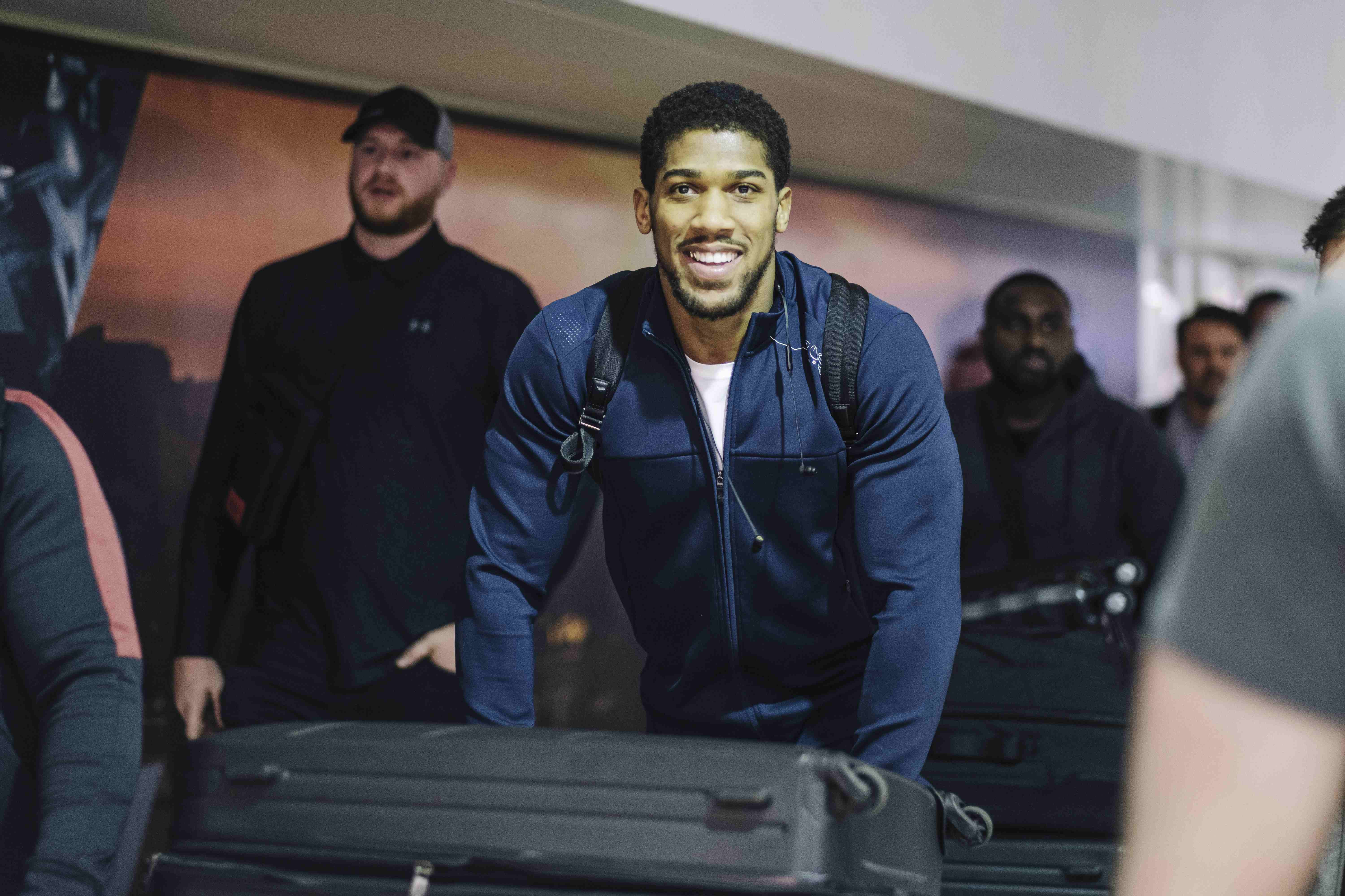 Joshua arrived in relaxed mood in Saudi Arabia ahead of his colossal rematch Credit: Diriyah Season