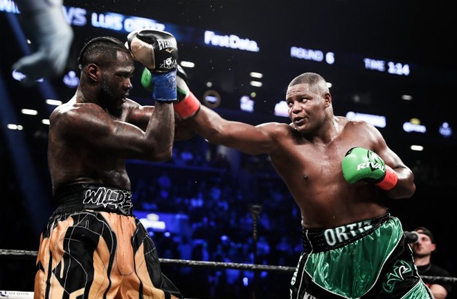Ortiz and Wilder in action. Photo credit: boxingscene.com
