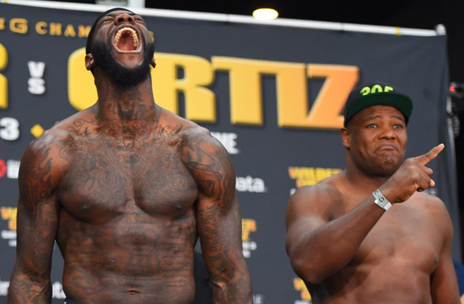 Ortiz and Wilder at their first weigh in. Photo credit: forbes.com