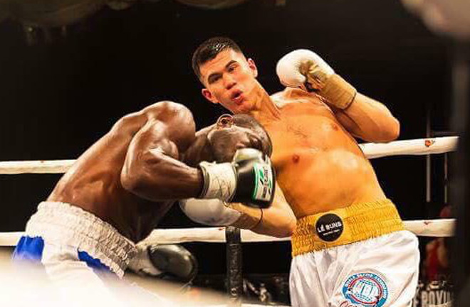 Reagan Dessaix in action. Photo credit: boxingnews24.com