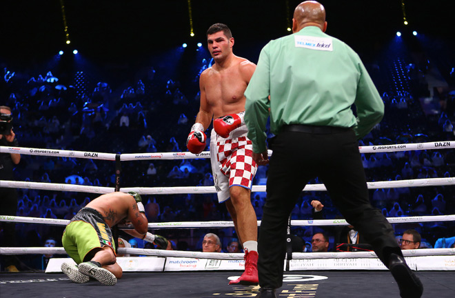 Eric Molina saw the canvas more than once during a short battle with Filip Hrgovic. Photo Credit: Mark Robinson/Matchroom Boxing