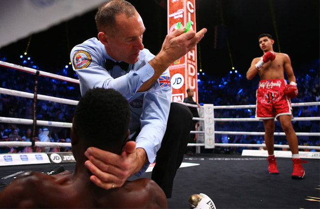 The referee moves Diego Pacheco away after he scored an emphatic 1st round knockout of Tanzania's Selemani Saidi. Photo Credit: Mark Robinson/Matchroom Boxing.