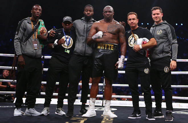 Dillian Whyte with his team post fight celebrating what's been a tough 2019 both in and out of the ring. Photo Credit: Mark Robinson/Matchroom Boxing