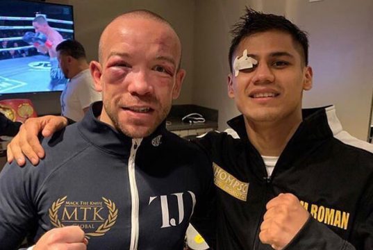 Danny Roman and TJ Doheny showing off their war wounds Credit: MTK Global / Thompson Boxing