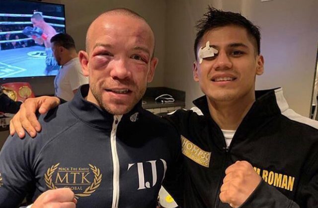 Danny Roman and TJ Doheny showing off their war wounds Credit: MTK Global / Thompson Boxing