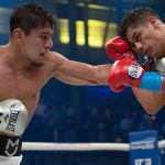 Murodjon Akhmadaliev takes two belts with split decision win over Daniel Roman. Photo Credit: www.proboxing-fans.com
