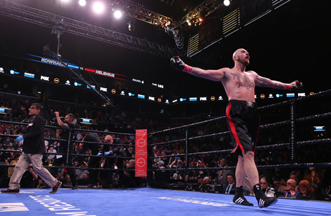 Helenius celebrates after winning the WBA world heavyweight title eliminator Credit: BT Sport Boxing