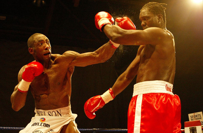 Johnny Nelson duding the heat of the battle. Photo Credit: The Mirror.