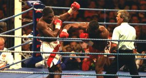 Lewis stopped British rival Frank Bruno in their WBC heavyweight title clash in Cardiff in 1993 Photo Credit: The Telegraph