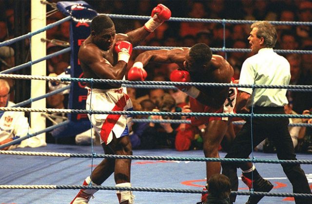 Lewis stopped British rival Frank Bruno in their WBC heavyweight title clash in Cardiff in 1993 Photo Credit: The Telegraph