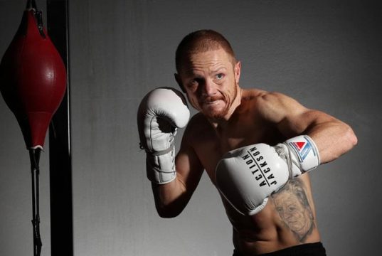 Luke 'Action' Jackson posing for a photoshoot. Photo Credit: The Mercury