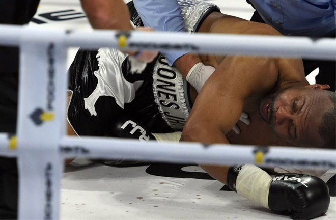 Jones Jr, a beaten man upon the canvas at the hands of Maccarinelli. Photo Credit: Irish Times