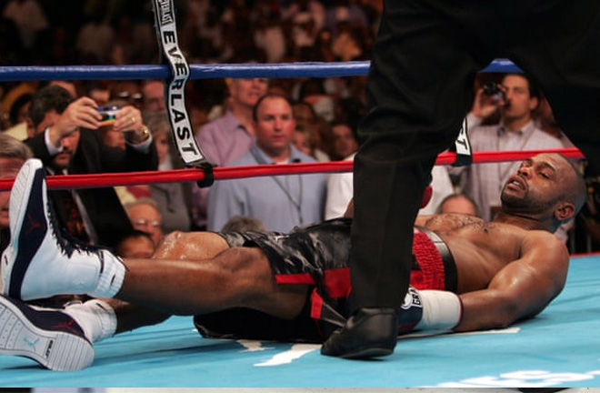 Roy Jones Jr flat on his back on the canvas, a place where he would become acclimatised to ifor the remainder of his career. Photo Credit: The Guardian