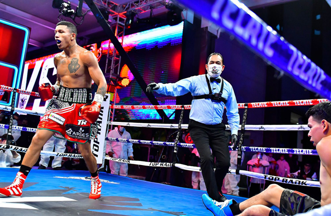 Berchelt could not hide his elation after scoring a first round knockdown on route to a sixth round win Photo Credit: Zanfer Promotions