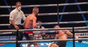 Lewis Crocker dropping Louis Greene en route to a stoppage victory. Photo Credit: Scott Rawsthorne/MTK Global