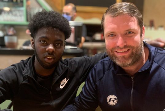 Adan Mohamed and his manager Alfie Warren. Photo Credit: Twitter / @alfieRwarren