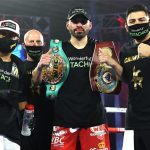 Ramirez celebrates with coach Robert Garcia and his team after victory Photo Credit: Mikey Williams/Top Rank