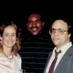 Kathy pictured alongside Evander Holyfield and late husband Dan Duva Photo Credit: Main Events