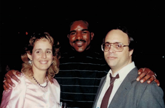 Kathy pictured alongside Evander Holyfield and late husband Dan Duva Photo Credit: Main Events