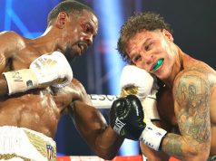 After repeated intentional head butts by Jonathan Oquendo, the winner by 8th-round DQ and still WBO Jr. Lightweight World Champion is Jamel Herring. Photo Credit: Top Rank.
