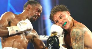 After repeated intentional head butts by Jonathan Oquendo, the winner by 8th-round DQ and still WBO Jr. Lightweight World Champion is Jamel Herring. Photo Credit: Top Rank.