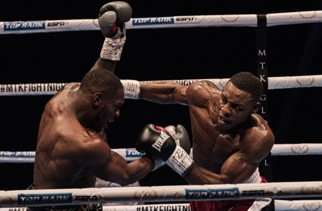 Dan Azeez retained his English title with a ninth round stoppage over Andre Sterling Photo Credit: Scott Rawsthorne / MTK Global