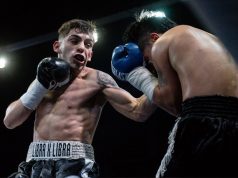 Andre Campos in action delivering a left hand uppercut to his opponent. Photo Credit: Antonio Avilab