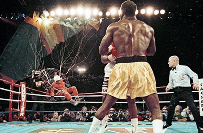 Duva was ringside when the infamous 'fan man' landed on the ring apron during the 1993 heavyweight championship rematch between Holyfield and Bowe