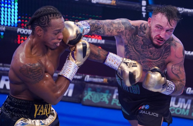 Spelman had some spells of success early on against Yarde Photo Credit: Round 'N' Bout Media / Queensberry Promotions