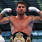 Jamie Cox with one of his titles he claimed iduring his winning streak. Photo Credit: Boxing News Online