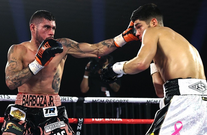 Arnold Barboza Jr climbed off the canvas to beat Alex Saucedo Photo Credit: Mikey Williams/Top Rank