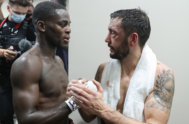 Buatsi and Calic embrace following their frantic battle Photo Credit: Mark Robinson / Matchroom Boxing