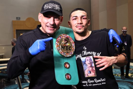 Lopez celebrates with father Teofimo Lopez Sr post-fight Photo Credit: Mikey Williams/Top Rank