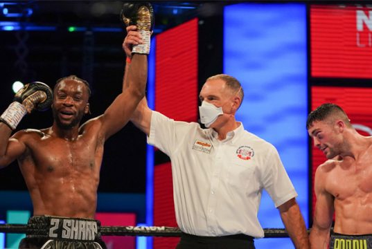 Bentley celebrates after winning the Lonsdale belt and winning his rematch with Heffron Photo Credit: Round 'N' Bout Media/Queensberry Promotions