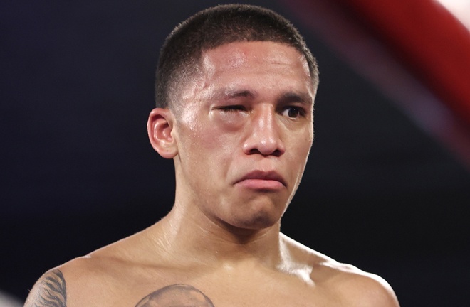 Joshua Franco was unable to continue after suffering an eye injury from what was ruled an Andrew Moloney head clash Photo Credit: Joshua Franco's eye closed from what the referee and video replay officials deemed a headbutt Photo Credit: Please credit Mikey Williams/Top Rank via Getty Images