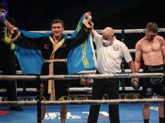 Tursynbay Kulakhmet celebrates after claiming beating a dejected Macaulay McGowan on Wednesday Photo Credit: Scott Rawsthorne/MTK Global