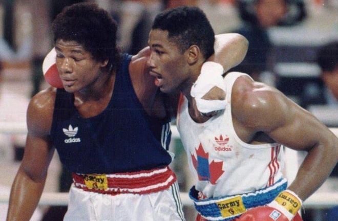 Lewis never faced Olympic rival Riddick Bowe in the pro ranks Photo Credit: thegruelingtruth.com