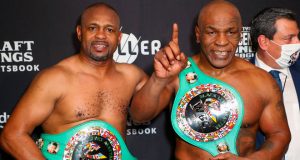 Mike Tyson vs Roy Jones Jr ended in a draw. Both men posed after the bout with their belts following their split draw decision. CREDIT: USA TODAY SPORTS