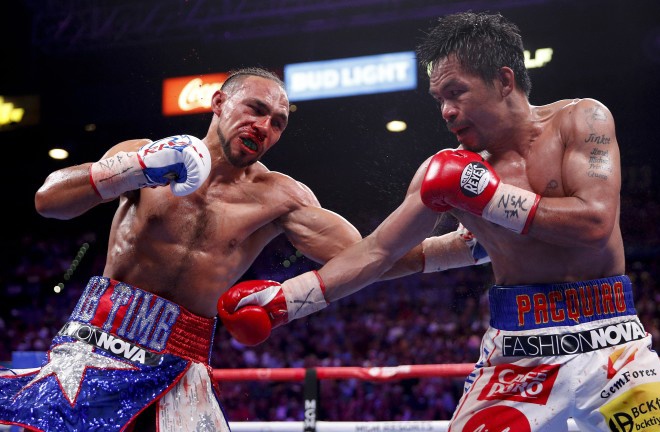 Pacquiao claimed the WBA 'Super' Welterweight crown from Keith Thurman Photo Credit: John Locher / Associated Press